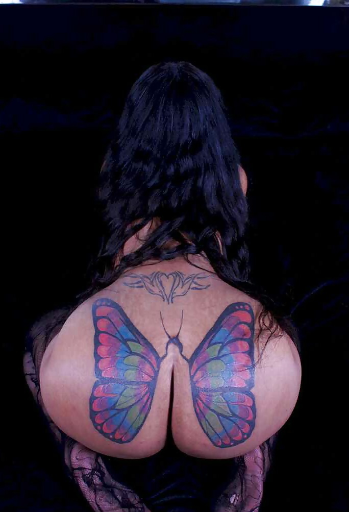 Pornstar with tattoo on left shoulder