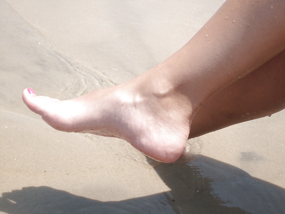 Free My sexy wife's feet at the beach photos