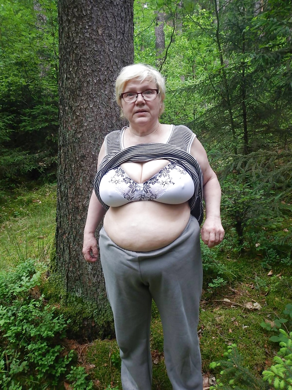 Free Busty granny in forest photos