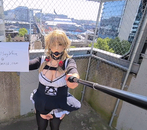 Sissy maid flashing in the city #13