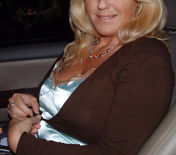 Free Mrs. Betty Boobman - older pics of  her topless in the car photos