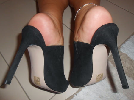 luminous contours of legs heels and ass         