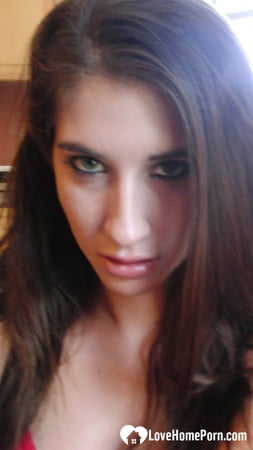 brunette cutie gets some cum over herself         