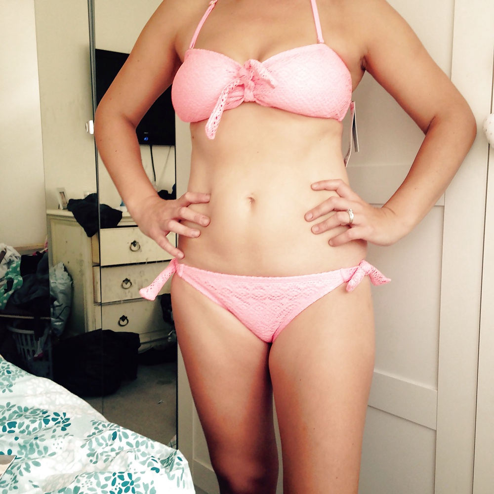 Free British wife in bikini getting changed photos