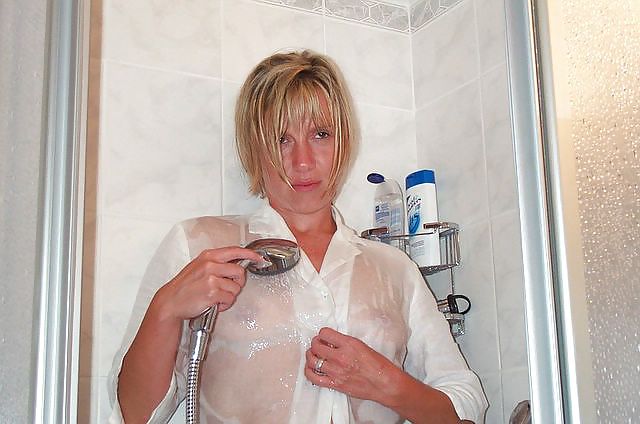 Free Karin takes a shower in a wet blouse - N. C. photos