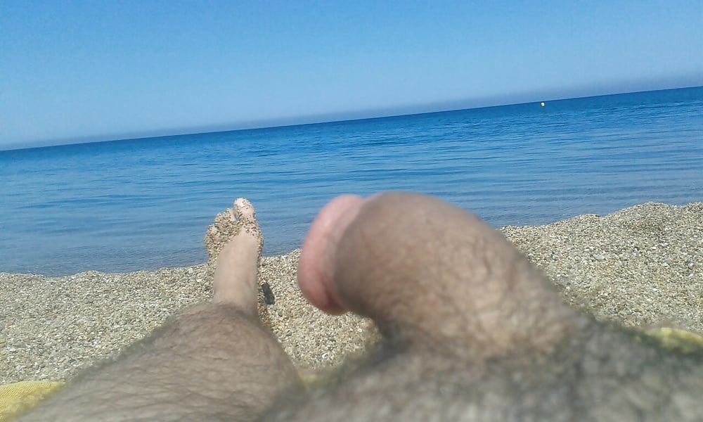 Free My cock in front of the sea photos