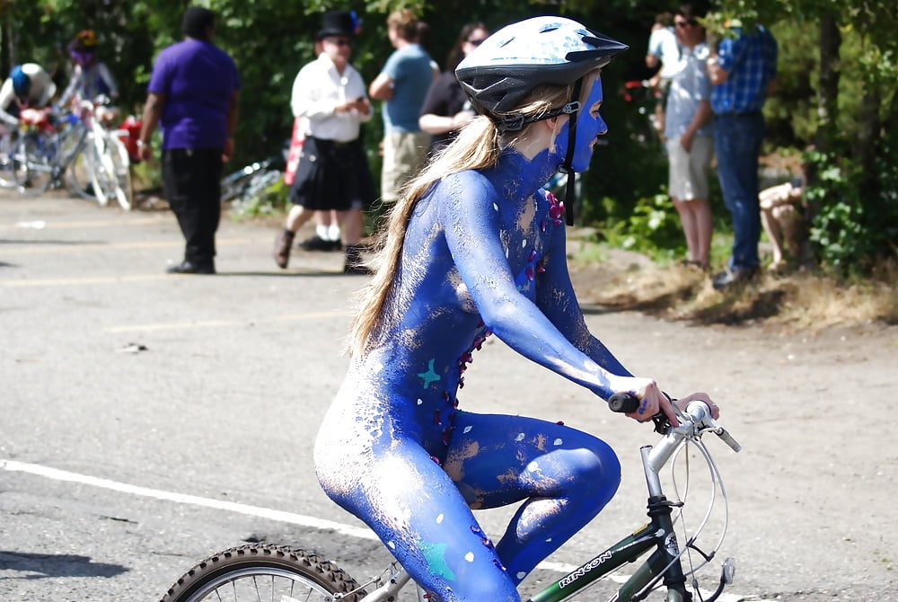 Free Nude teen body-painted for naked bike ride photos