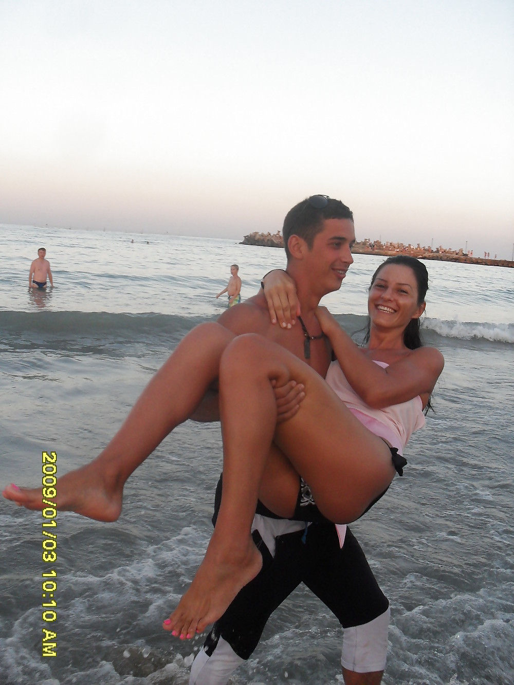 Free Black Sea Topless Familly photos