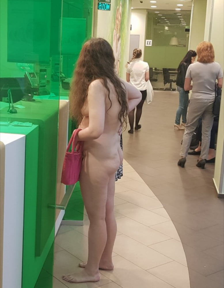 Nude girl appeared in bank - 2 Photos 