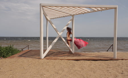red shawl on windy weather         