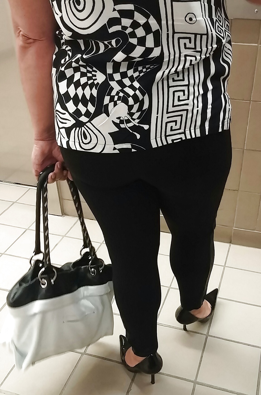 Free Cookie's thick legs and ass at work. photos