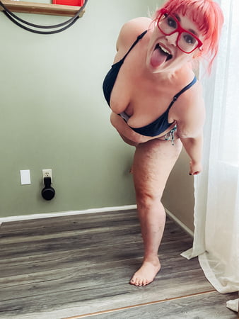 bbw tries on a micro bikini striping down and gets naked         