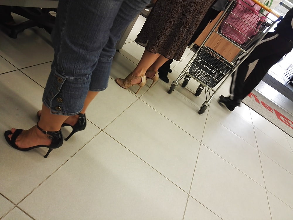 Free Candid feet in heels times two photos