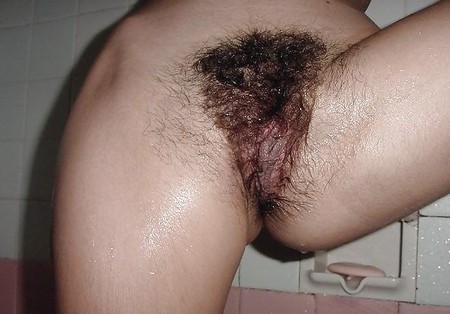 Busty hairy teen taking shower