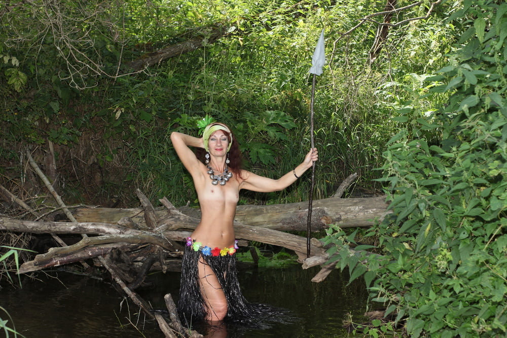 Savage Girl in River  