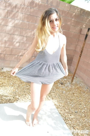 pretty teen prefers to undress herself outdoors         