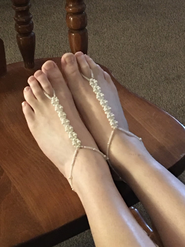 Afternoon foot job in tights feet cum on them