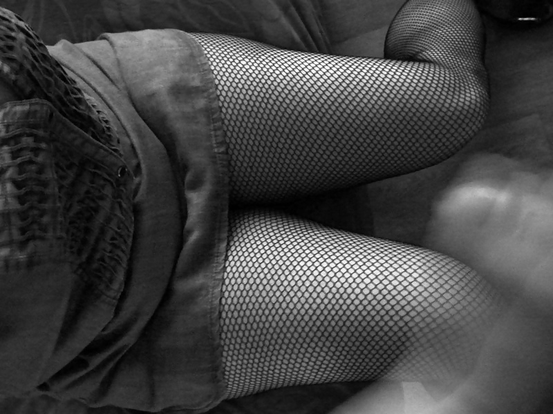 Free my sexy wife in black fishnet stockings Mmmmm photos