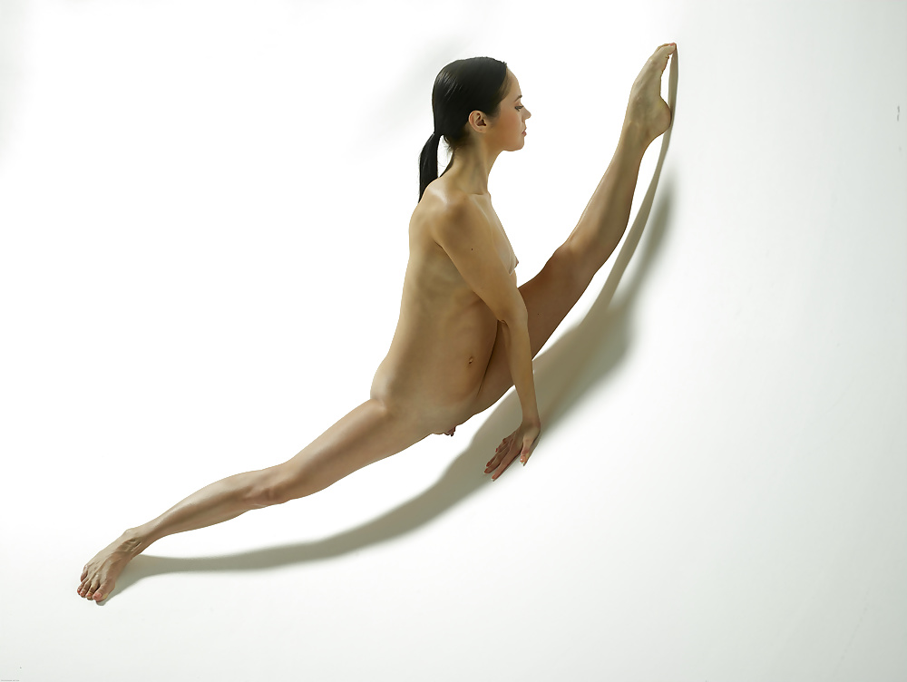 Free Magdalena - Stretching On The White Background photos