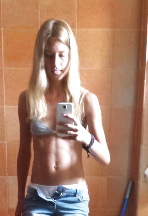 Free Skinny Teen Strips Showing Her Bush photos