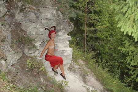 forest satyr on the rock         