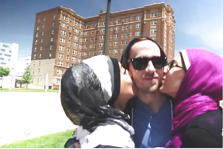 Free Veiled Arab slut kissing white dude photos