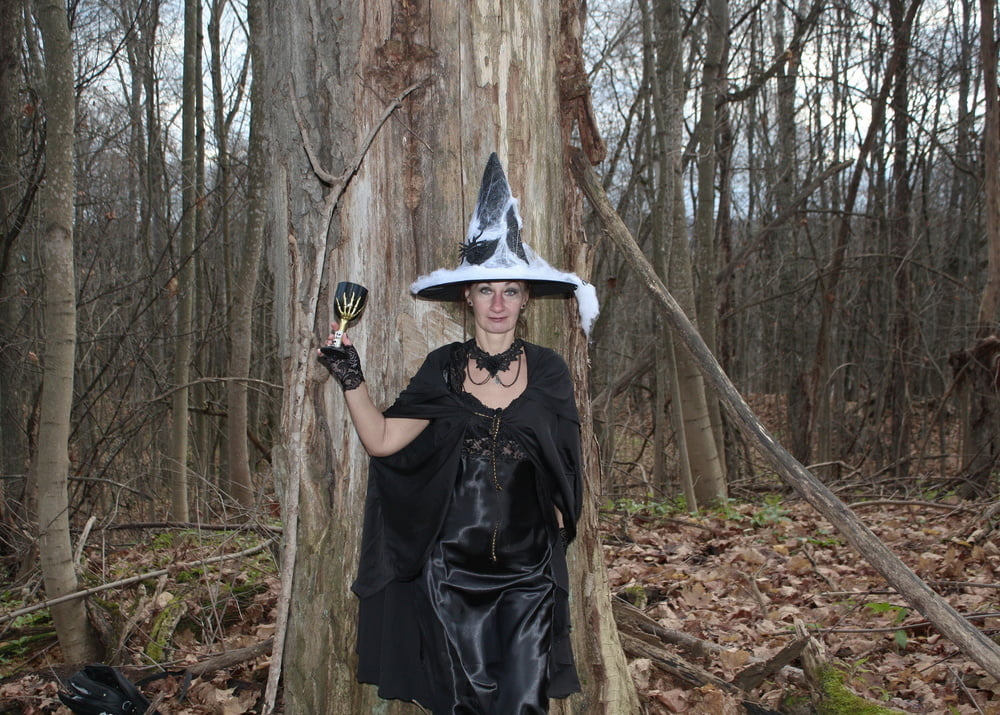 Witch with broom in forest - 51 Pics 